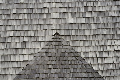 Wooden shingle on a house roof at an old farmers house