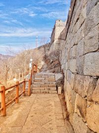 View of staircase against cloudy sky