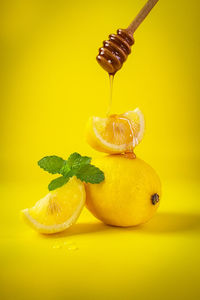 Close-up of lemon slice in plate