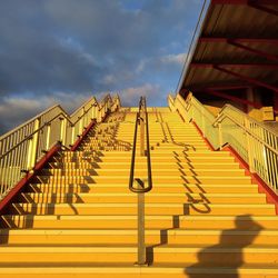 Low angle view of staircase against sky