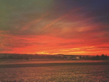 Scenic view of landscape at sunset
