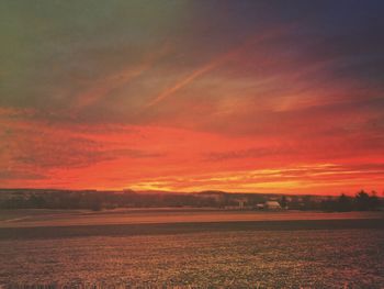 Scenic view of landscape at sunset