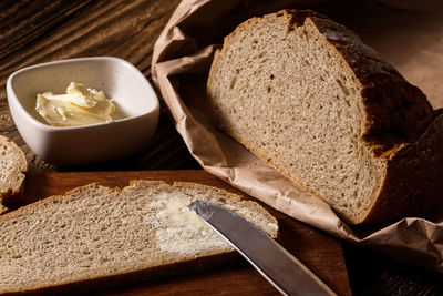 High angle view of bread on cutting board