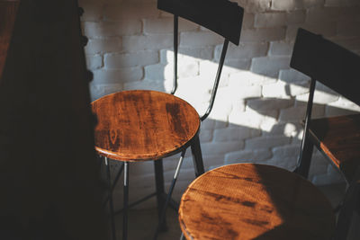 High angle view of empty chairs on table