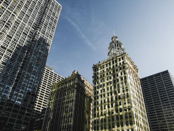 Low angle view of skyscrapers against sky