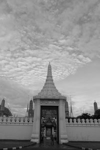Facade of temple against sky