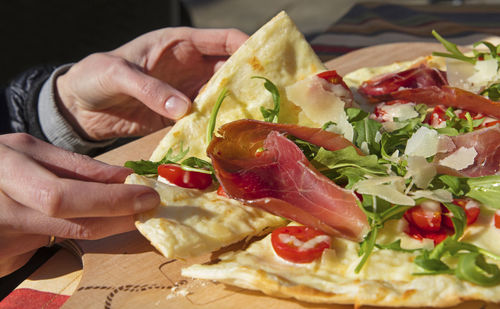 Close-up of hand holding food