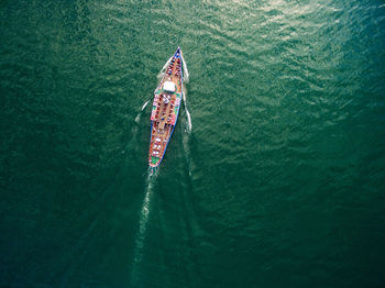 High angle view of people on boat in sea