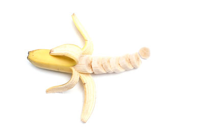 Close-up of bananas against white background