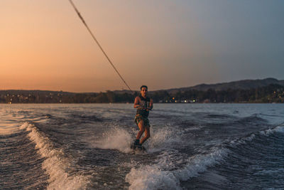 Man wakeboarding in sea