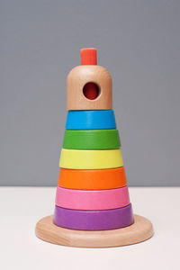 Close-up of colorful stack against white background