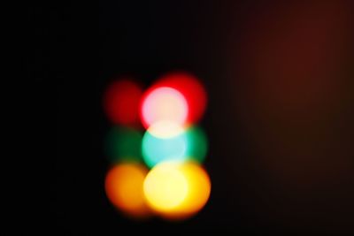 Defocused image of illuminated lights at night