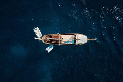 High angle view of ship sailing in sea