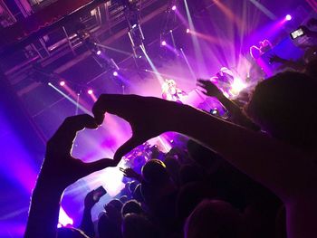 People enjoying at concert