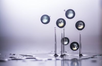 Water drops falling on table