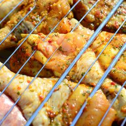 High angle view of meat on barbecue grill