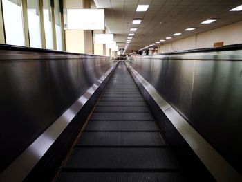 Empty illuminated underground walkway