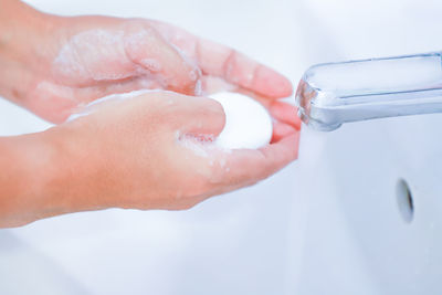 Close-up of person holding hands