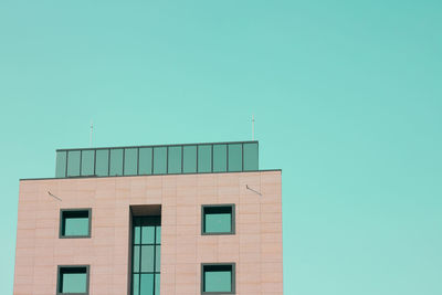 Low angle view of building against clear sky