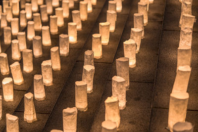 Handmade japanese washi paper lanterns aligned in circles illuminating the zojoji temple.