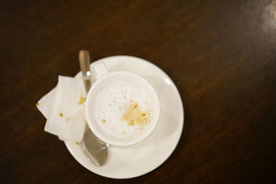 High angle view of coffee cup on table