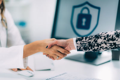 Handshake after signing medical data form