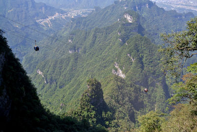 Extraordinary mountain view in hunan province, china and cable cars give tourists special experience 