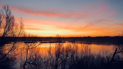 Scenic view of lake during sunset