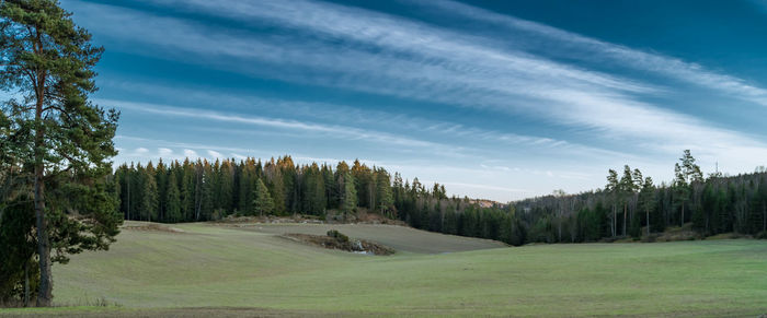 Panoramic view of farm against sky