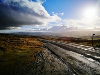 Rural landscape under cloudy sky