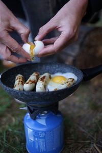 Close-up of person preparing food