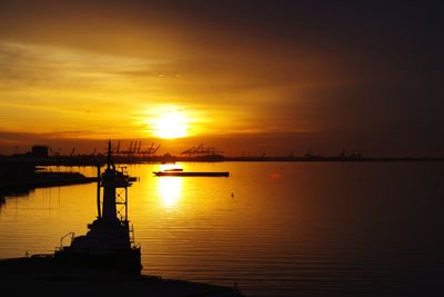 Scenic view of lake during sunset