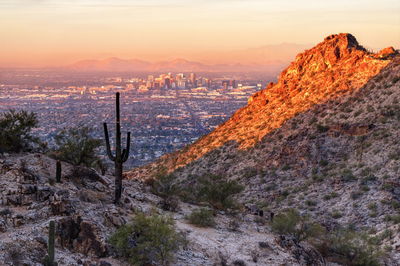 Scenic view of cityscape during sunset