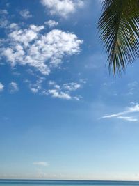 Scenic view of sea against blue sky