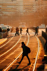 High angle view of people walking on street in city