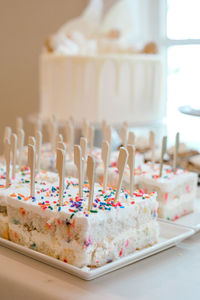 Close-up of cake slices in plate on table