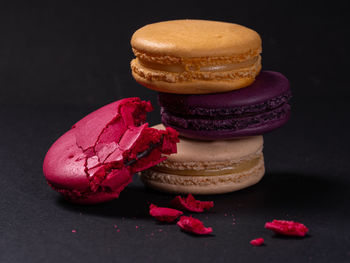 Close-up of cupcakes against black background