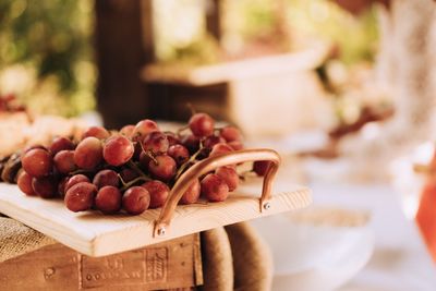 Close-up of fruits in basket at market stall