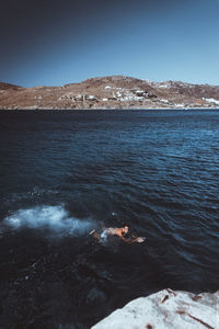 High angle view of sea against clear sky