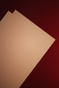 High angle view of paper against wall