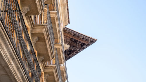 Low angle view of historic building against clear sky