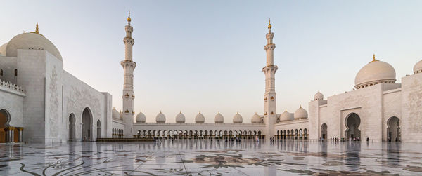 Panoramic view of buildings against clear sky