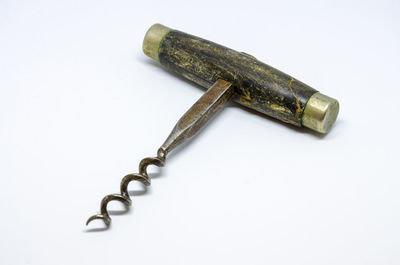 Close-up of chain against white background