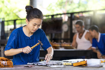 Woman working on table