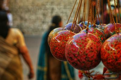 Close-up of decorations hanging at market