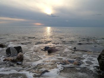 Scenic view of sea against sky during sunset