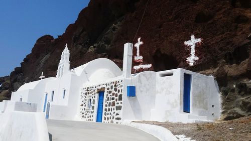 Chapel against mountain at santorini