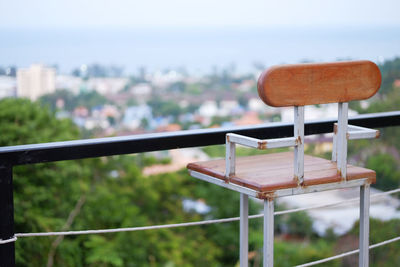 Close-up of empty chairs on table