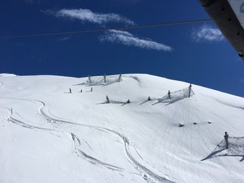 Scenic view of snowcapped mountain against sky