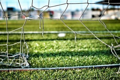 Close-up of damaged soccer goal